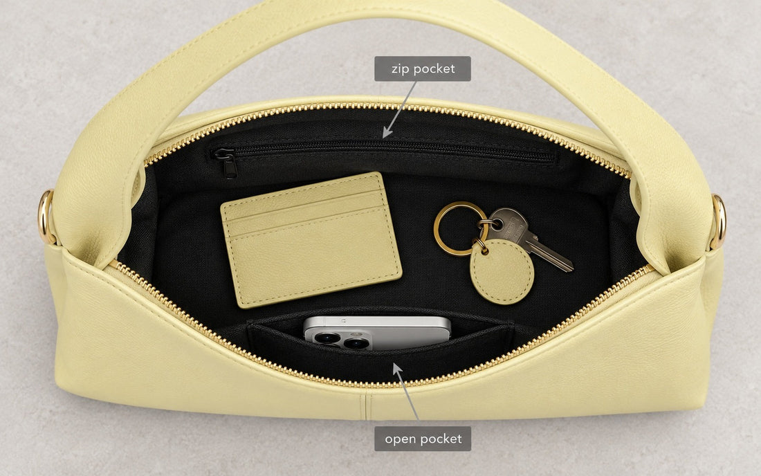 The interior of the Misariva Verona bag seen from above, with phone, wallet and keys